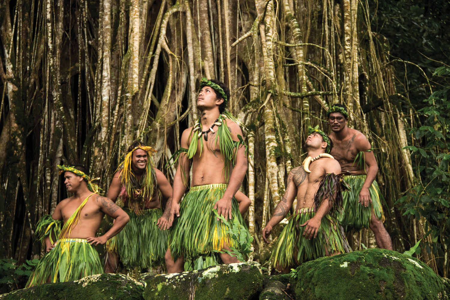Marquesan men perform a traditional dance