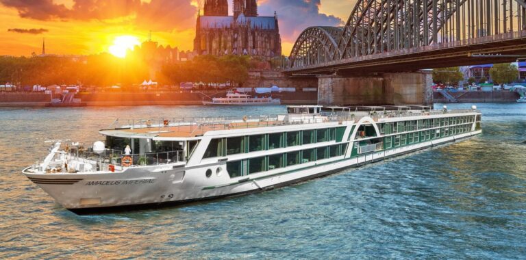 Cruise ship in river below a bridge