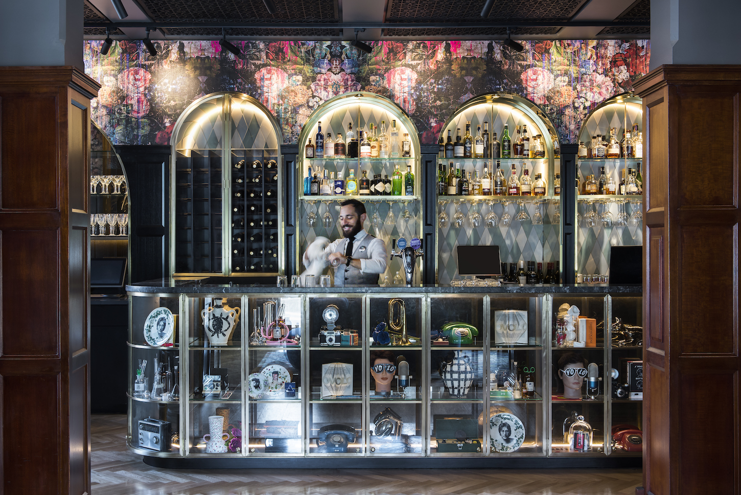 Bartender cleaning a glass