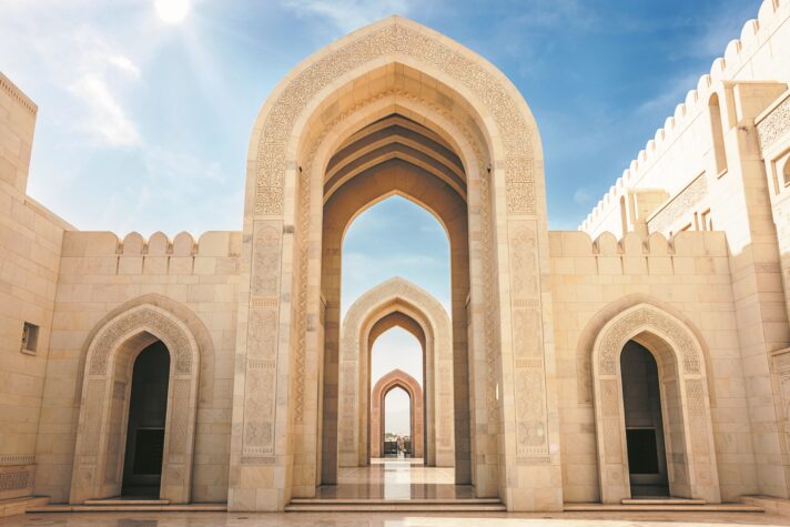GettyImages 174641715 Arches Sultan Qaboos Grand Mosque MuscatOman SCALED