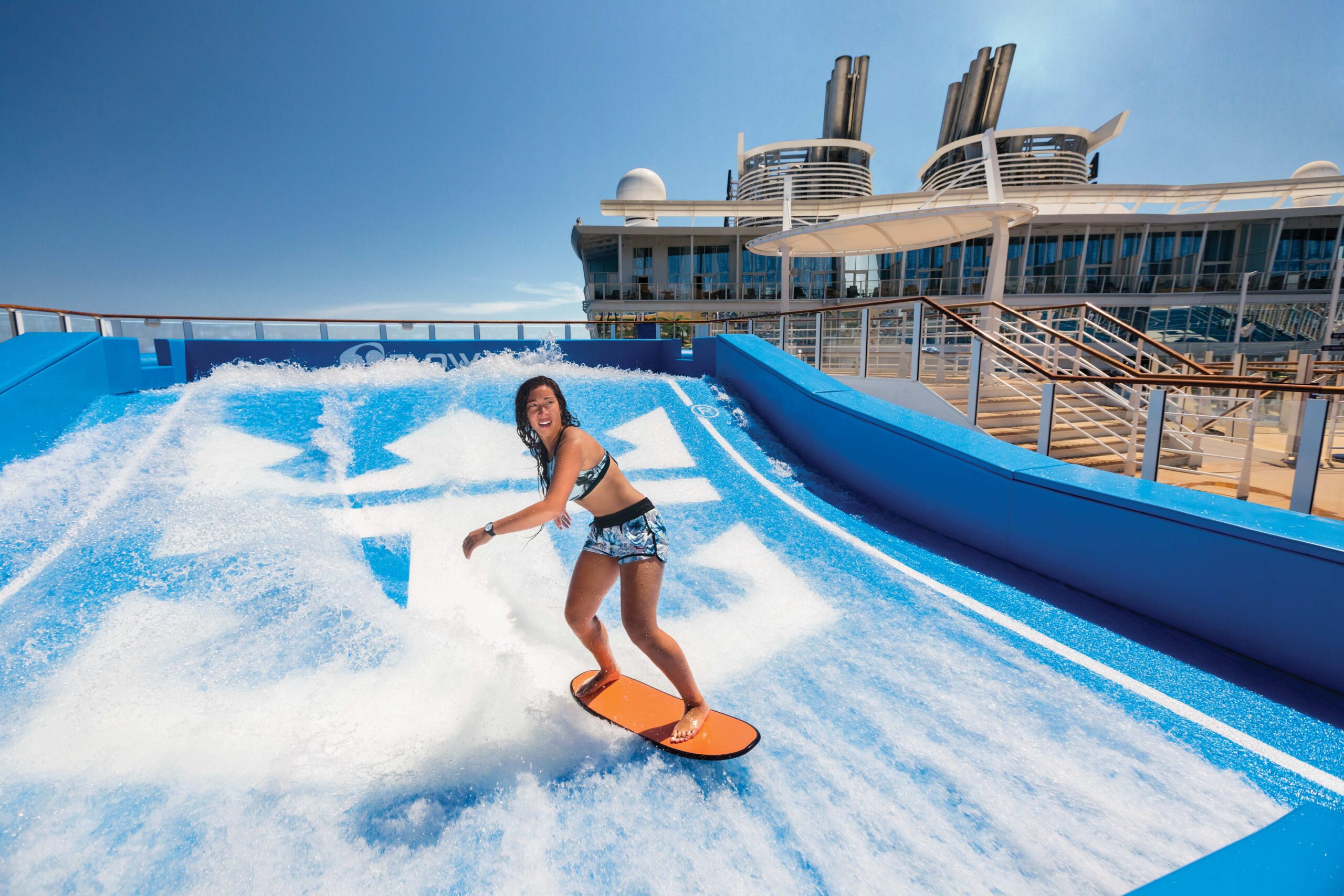 Woman onboarding surfing