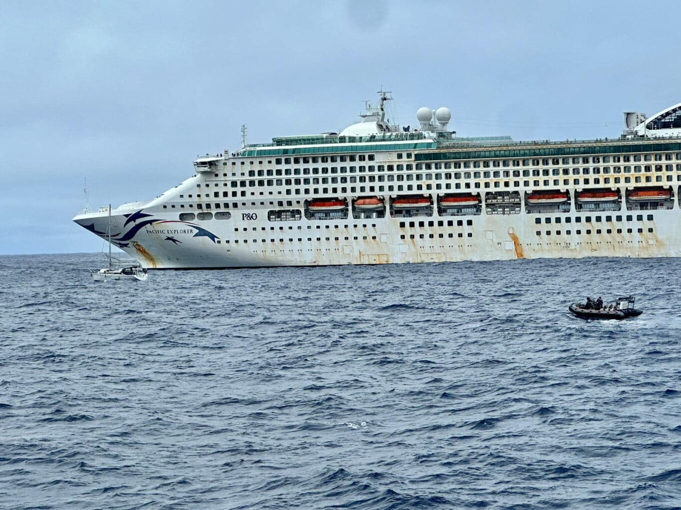 Pacific Explorer helps rescue sailors of a stricken yacht. 