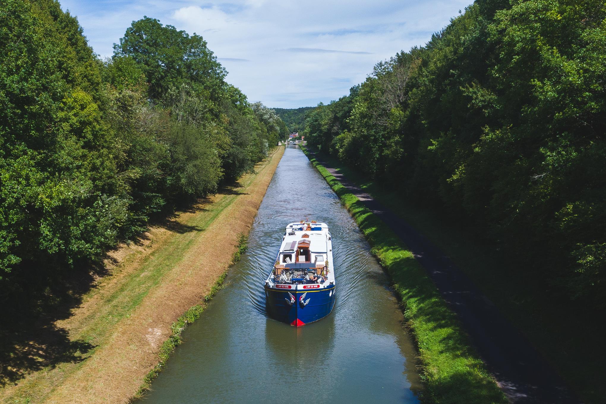 A canal boat on a cruise.