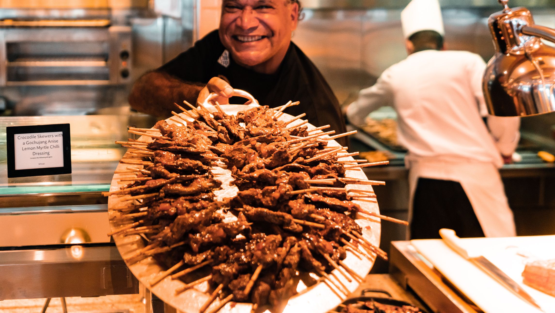 Mark olive with his best grilled meat on stick