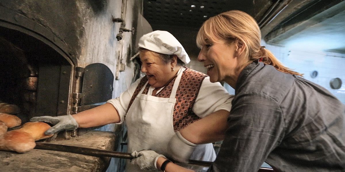 Karine of Viking River Cruises baking bread in Portugal