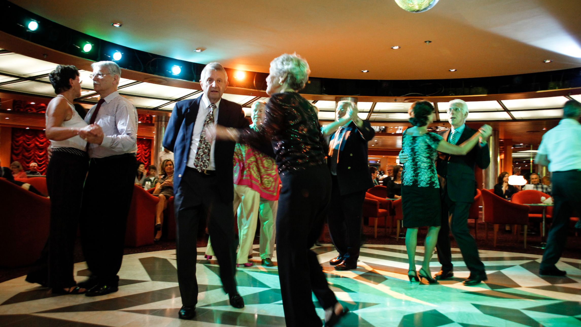 People dancing on a cruise ship.