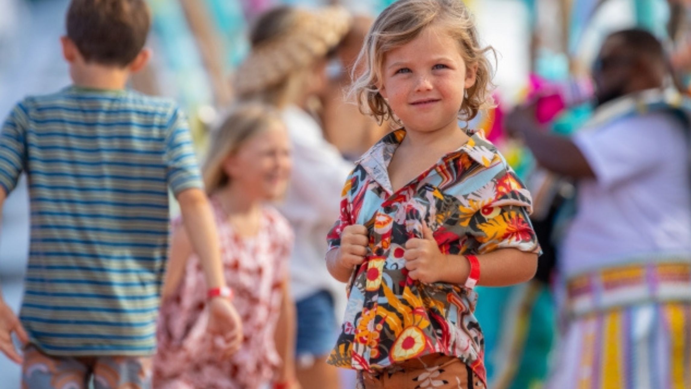 A young Royal Caribbean passenger smiles for a photo.